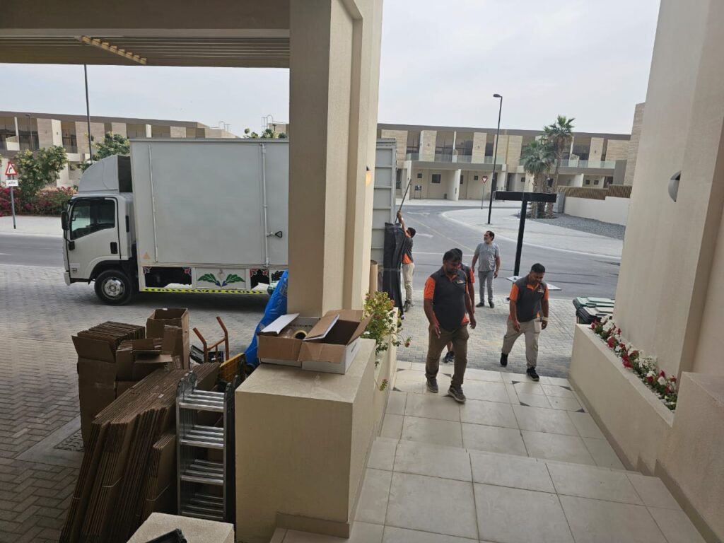 Professional office movers in Dubai packing IT equipment with anti-static materials